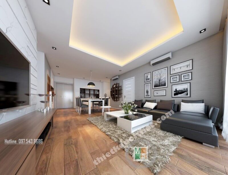 Khu vực phòng khách được sắp xếp hài hòa, khéo léo, 2 tone màu trắng và đen đóng vai trò chủ đạo được kiến trúc sư lồng ghép tinh tế mang lại không gian tiếp khách thêm phần sang trọng hơn