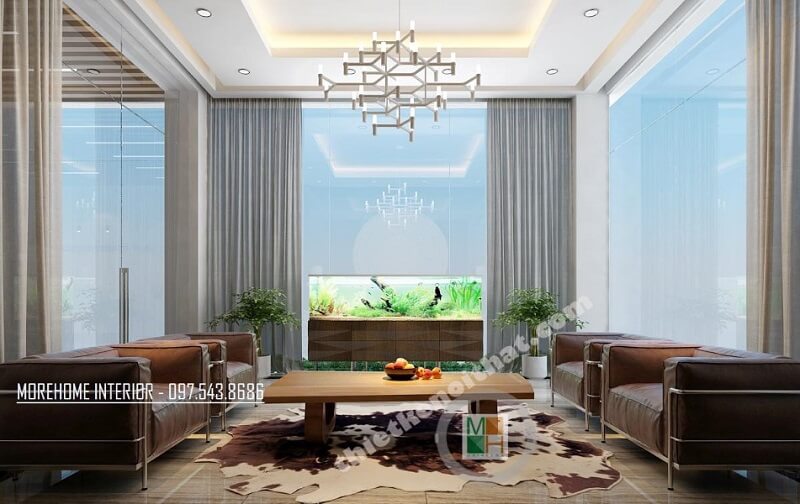 Mẫu thiết kế phòng tiếp khách tại sảnh lớn công ty VCC sang trọng, đẳng cấp với đồ nội thất cao cấp như: sofa da nhập khẩu, bàn gỗ tự nhiên, đèn trang trí,.. Thiết kế nội thất